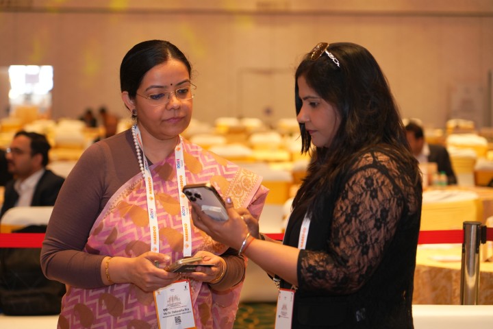 Dr. Renu Rana with a colleague at an industry event